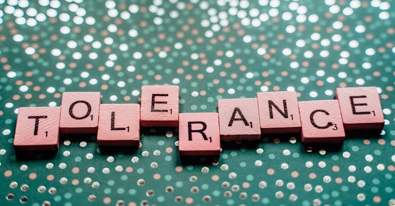 Close-up of scrabble tiles spelling 